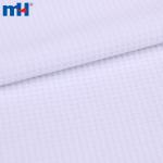 Birbirine kenetlenen jakarlı örgü kumaş