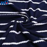Yarn-dyed jacquard and tweed fabric for garments