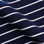 Yarn-dyed jacquard and tweed fabric for garments