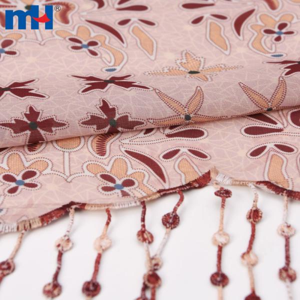 Tessuto chiffon decorato con nappine
