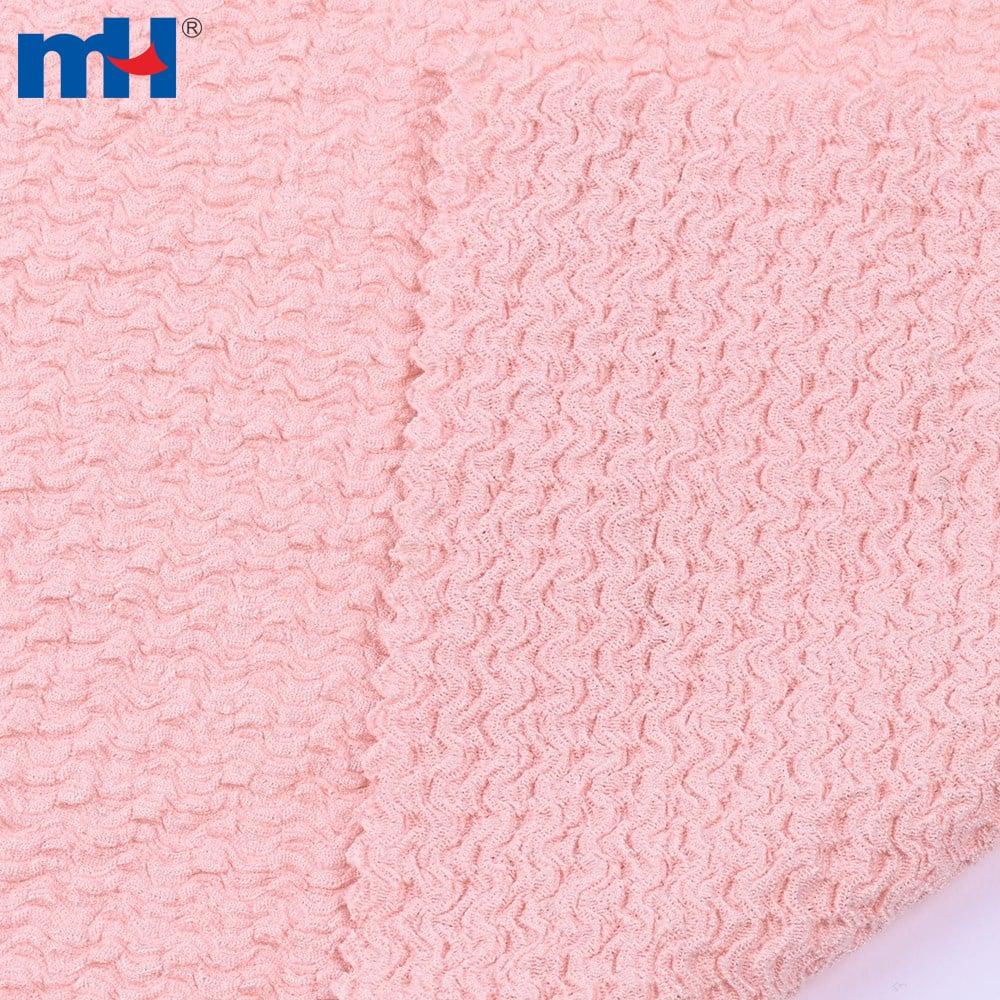 Pembe tüvit krep kumaş, %95 polyester %5 spandeks