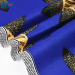 Tejido de poliéster estampado con cera real.