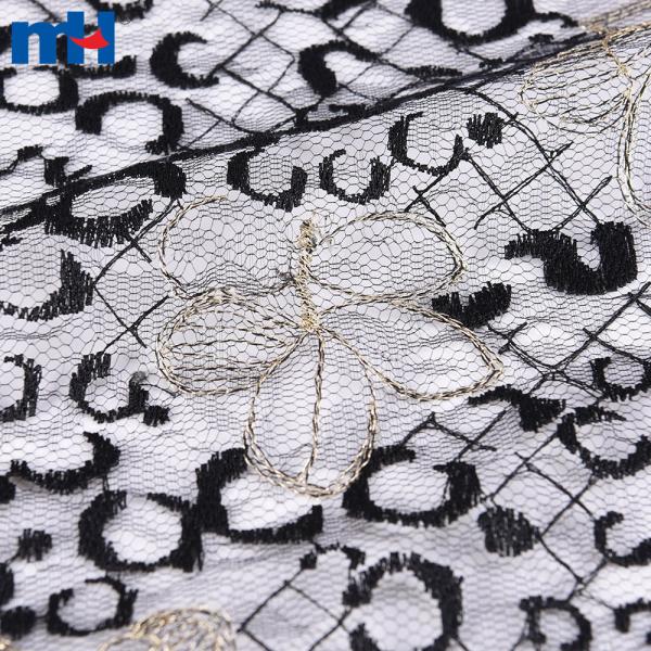 Pizzo floreale metallizzato oro/nero