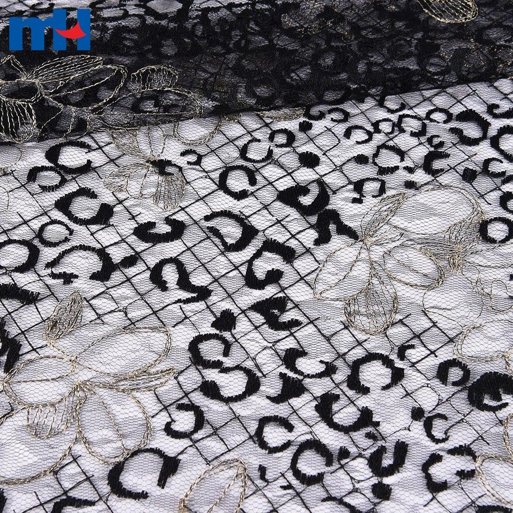 Pizzo floreale metallizzato oro/nero