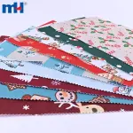 Dokunmamış keçe kumaştan yapılmış Noel temalı baskılar