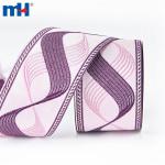 Embroidered ribbon with ethnic motifs