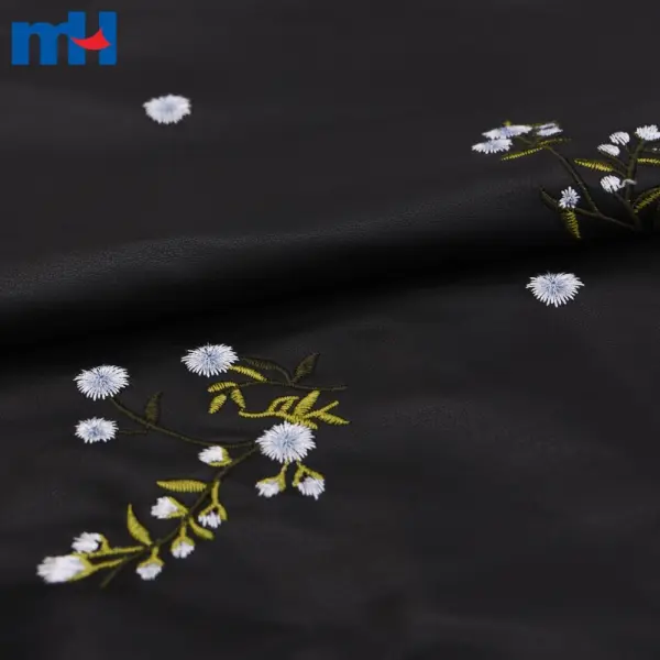 Çiçek işlemeli suni deri kumaş