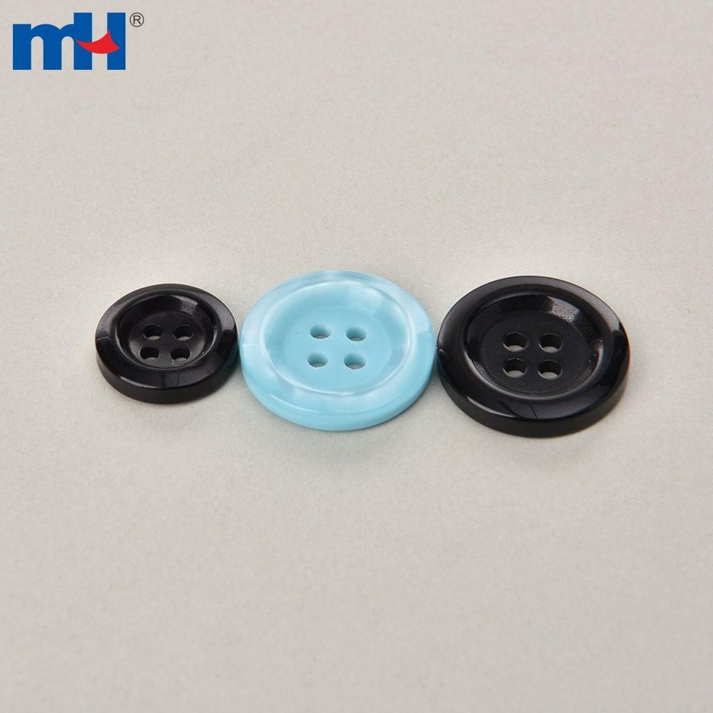 Sew-on resin buttons in different sizes