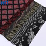Tessuto jacquard metallico elasticizzato per confezione di abiti