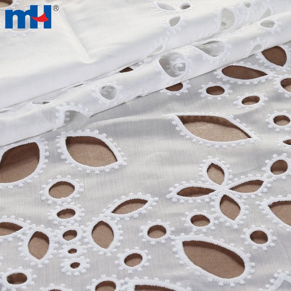 Embroidery on fabric by laser cutting