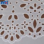 Embroidery on fabric by laser cutting