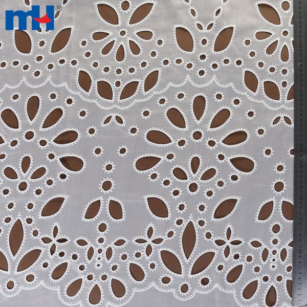Embroidery on fabric by laser cutting