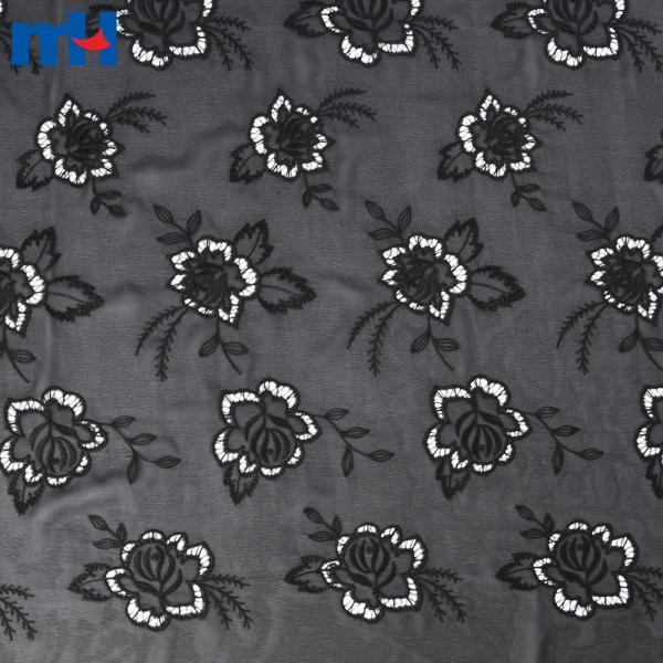 Laser cut embroidered lace