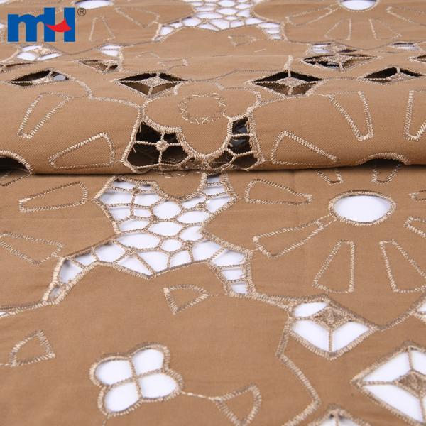 Embroidery on fabric by laser cutting
