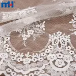 Tessuto a rete ricamato floreale bianco antico