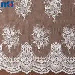 Tessuto a rete ricamato floreale bianco antico