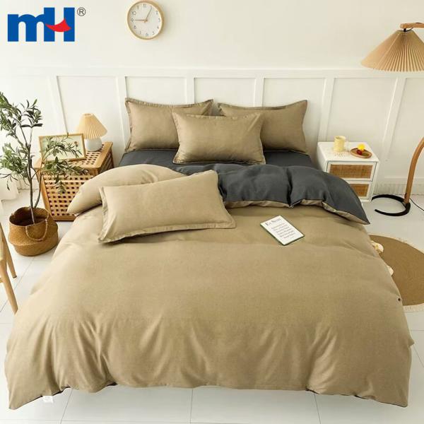Set biancheria da letto composto da quattro pezzi in fibra di poliestere tinta unita