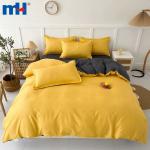 Set biancheria da letto composto da quattro pezzi in fibra di poliestere tinta unita