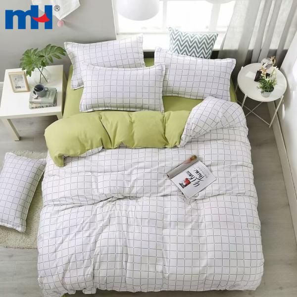 Set biancheria da letto composto da quattro pezzi in fibra di poliestere tinta unita