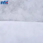 Tejido trasero bordado de algodón reciclado.