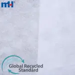 Tejido trasero bordado de algodón reciclado.