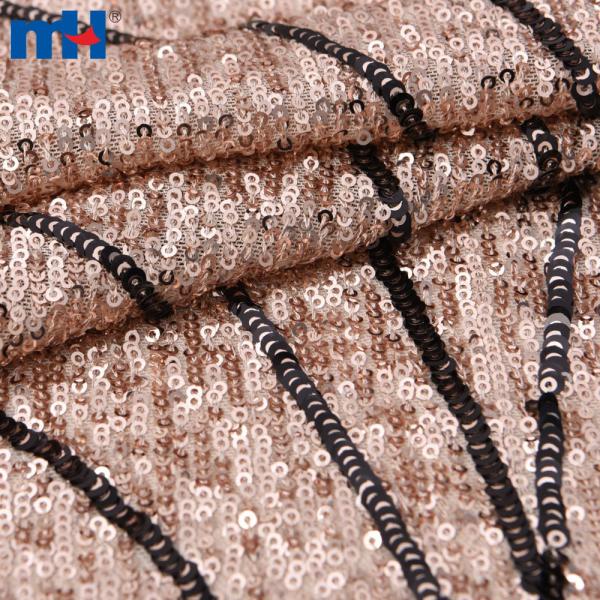Tissu à paillettes or rose
