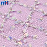 Wedding lace fabric decorated with sequins and pearls