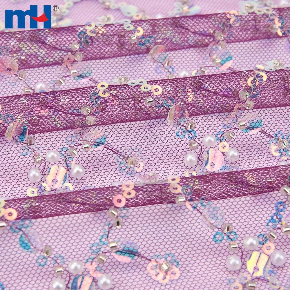 Wedding lace fabric decorated with sequins and pearls