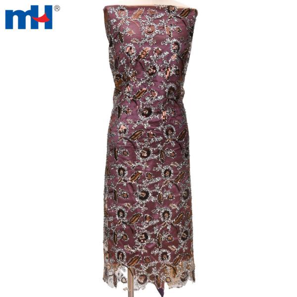Ricami in paillettes e pizzo