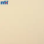 Tkanina nylonowo-bawełniana z domieszką amoniaku przeznaczona na męską odzież wierzchnią