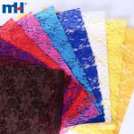 Tessuto di pizzo tricot – elegante motivo floreale