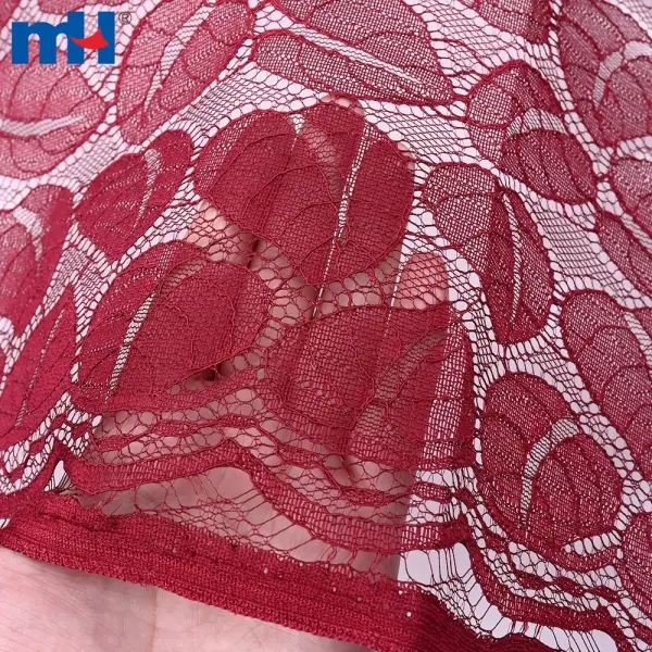 Tessuto di pizzo tricot non elastico con motivi a foglie