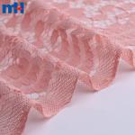 Non-elastic tricot lace fabric with a mix of large and small flowers
