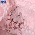 Non-elastic tricot lace fabric with a mix of large and small flowers
