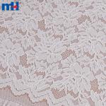 Tessuto in pizzo elasticizzato - elegante motivo floreale