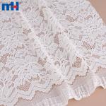 Tessuto in pizzo elasticizzato - elegante motivo floreale