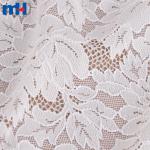 Tessuto in pizzo elasticizzato - elegante motivo floreale