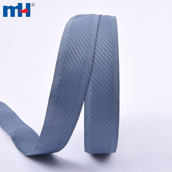 Diagonally striped mattress tape