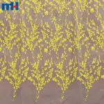 Жовта тканина органза з вишивкою